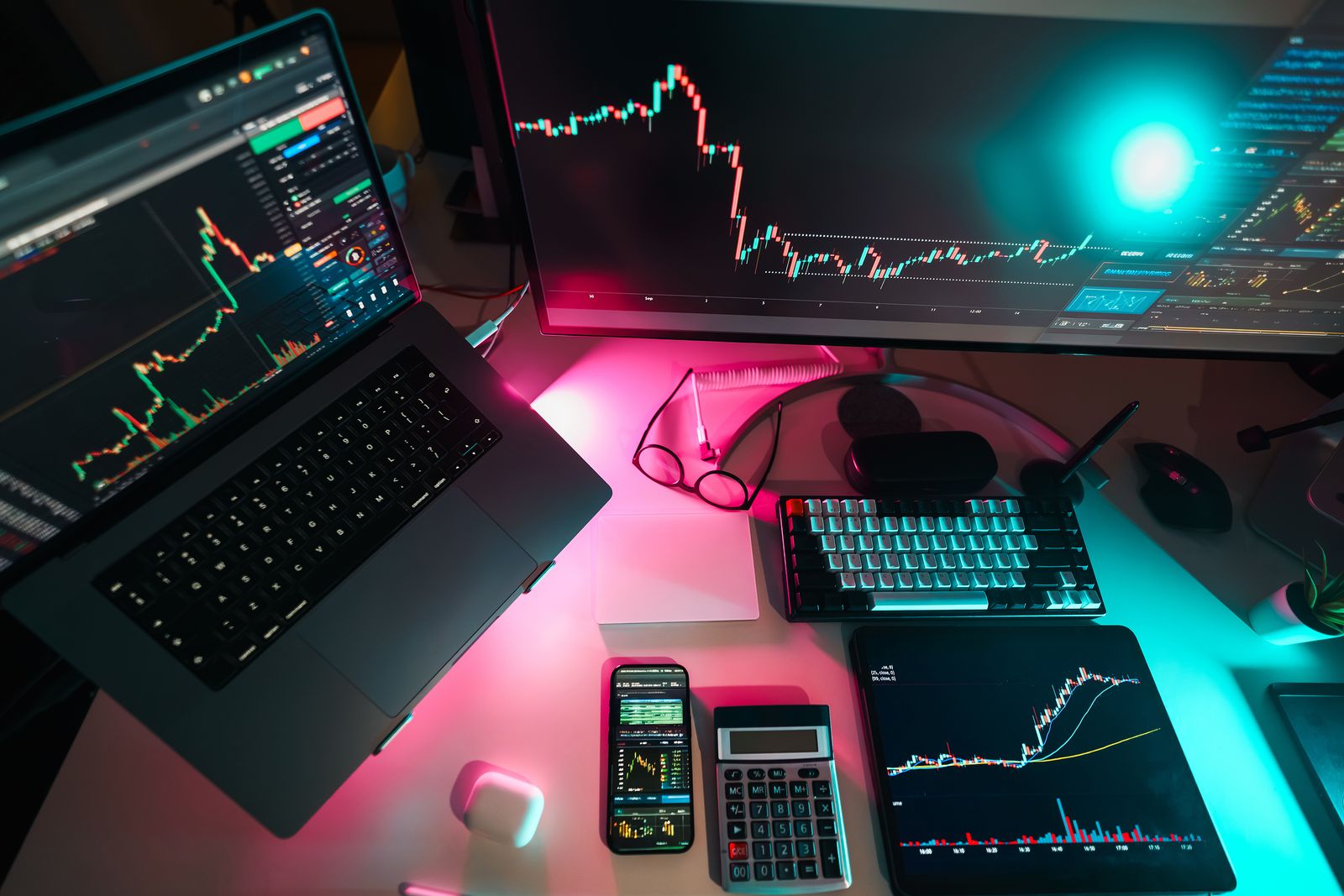 live cryptocurrency charts across a multi-screen workstation